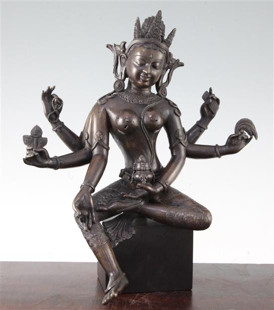 A large Nepalese bronze figure of Vasudhara, 19th century, 34.5cm